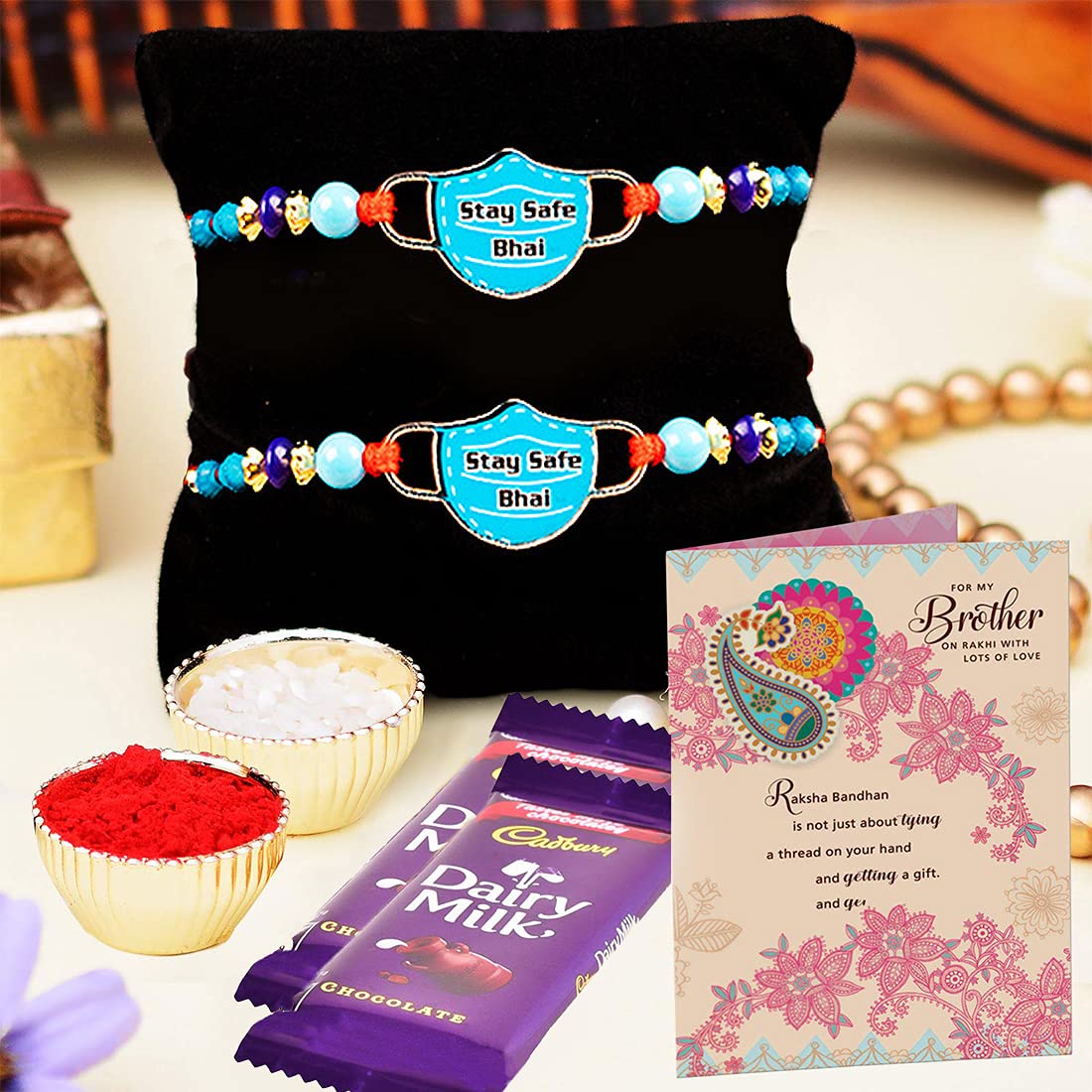 ARCHIES Rakhi for Brother Special Rakshabandhan Set of 2 Auspicious Mask Bhaiya/Bro/Bhai Rakhis with for Brother with 2 Dairymilk Chocolate & Greeting Card (Pack of 5) RK63