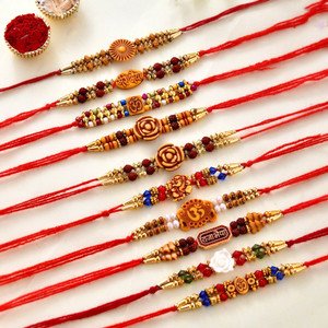 CraftVatika Religious RAKHI197 Mauli Thread, Pearl, Kundan Rakhi, Greeting Card Set (Multicolor Rakhi Combo Set of 10 for Brother with Greeting Card)